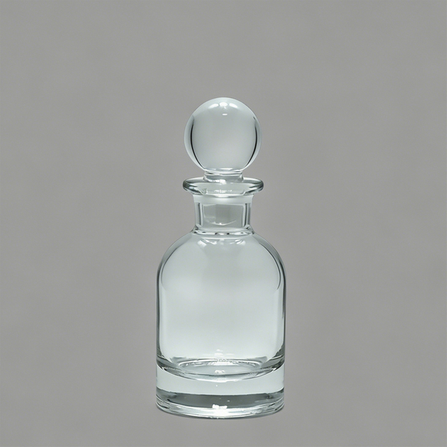 Frasco de perfume de vidrio transparente con tapón redondo para uso en aromaterapia en el hogar